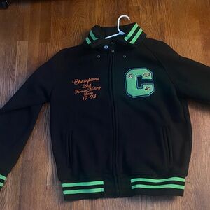 Black Jacket with green and orange. Champions jacket